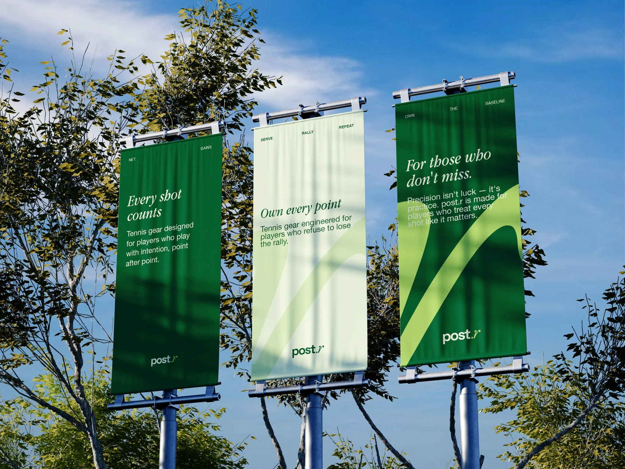 post.r banners on poles in a park