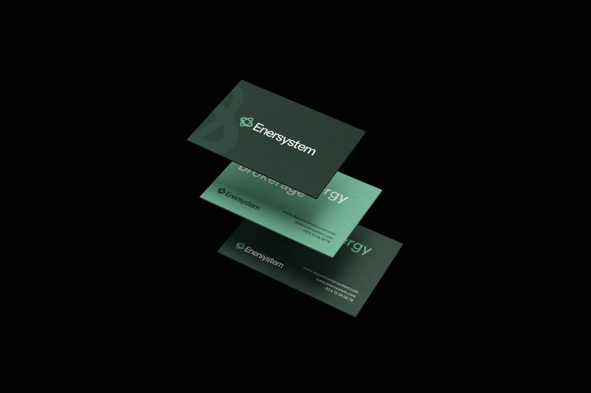 Enersystem business cards on a dark background