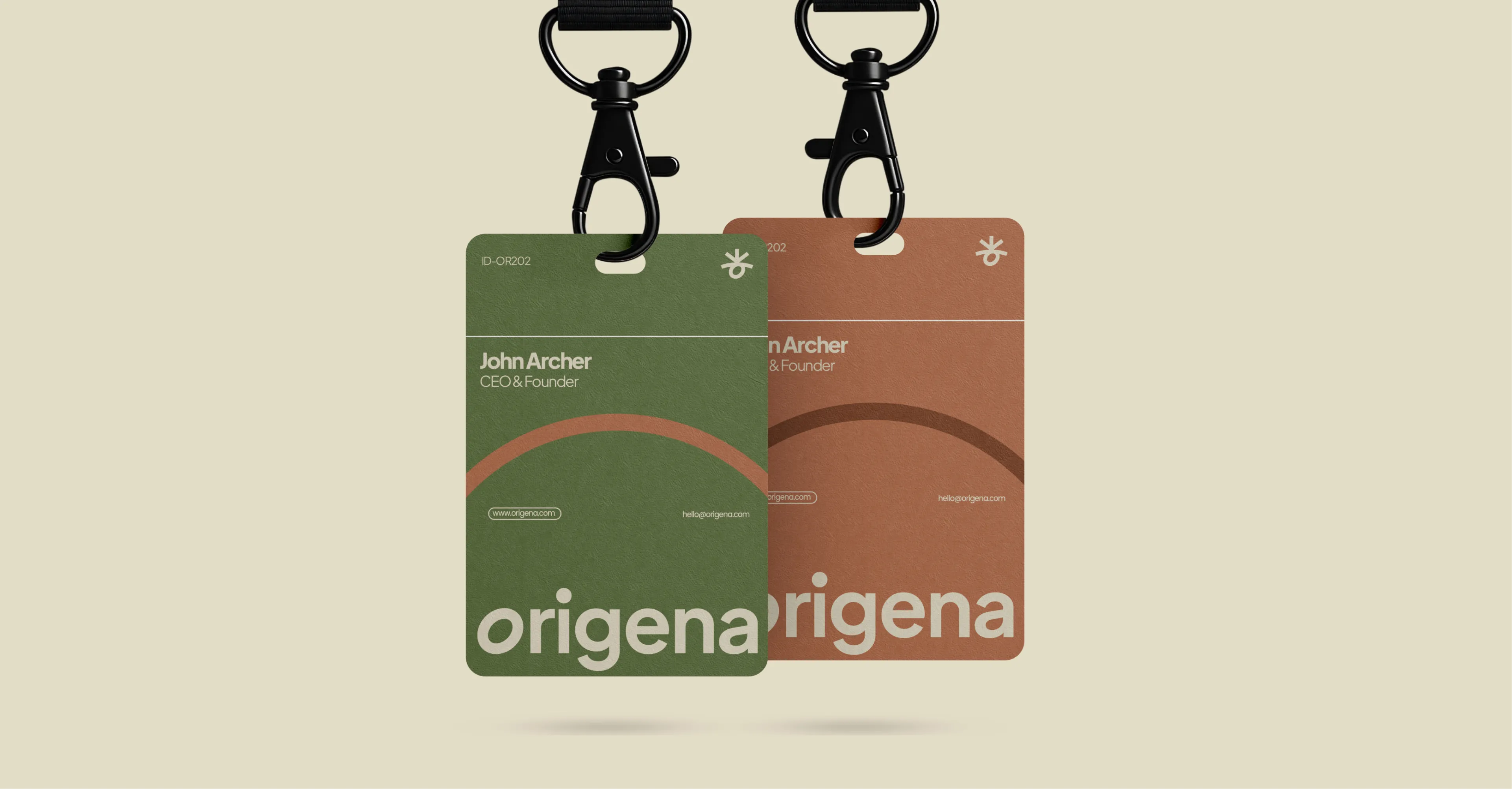 Green and terracotta Origena staff ID badges on black lanyards